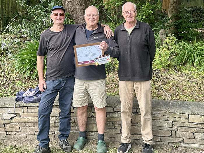 Proud Gardening Volunteers with Award